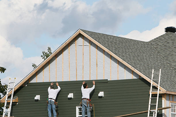 Professional Storm Damage Siding Repair technician working in Clarksburg, WV